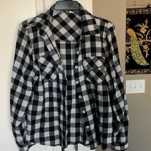 Size small, classic, black, and white checkered flannel.